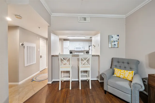 a living room with furniture and a table