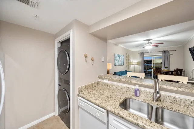 a view of a kitchen counter space and wooden floor