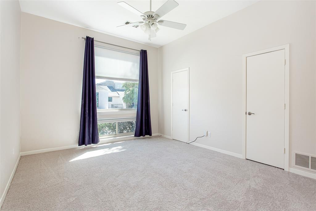 6807 Anglebluff Circle Dallas, TX 75248 - Photo 5 of 28 an empty room with windows and closet