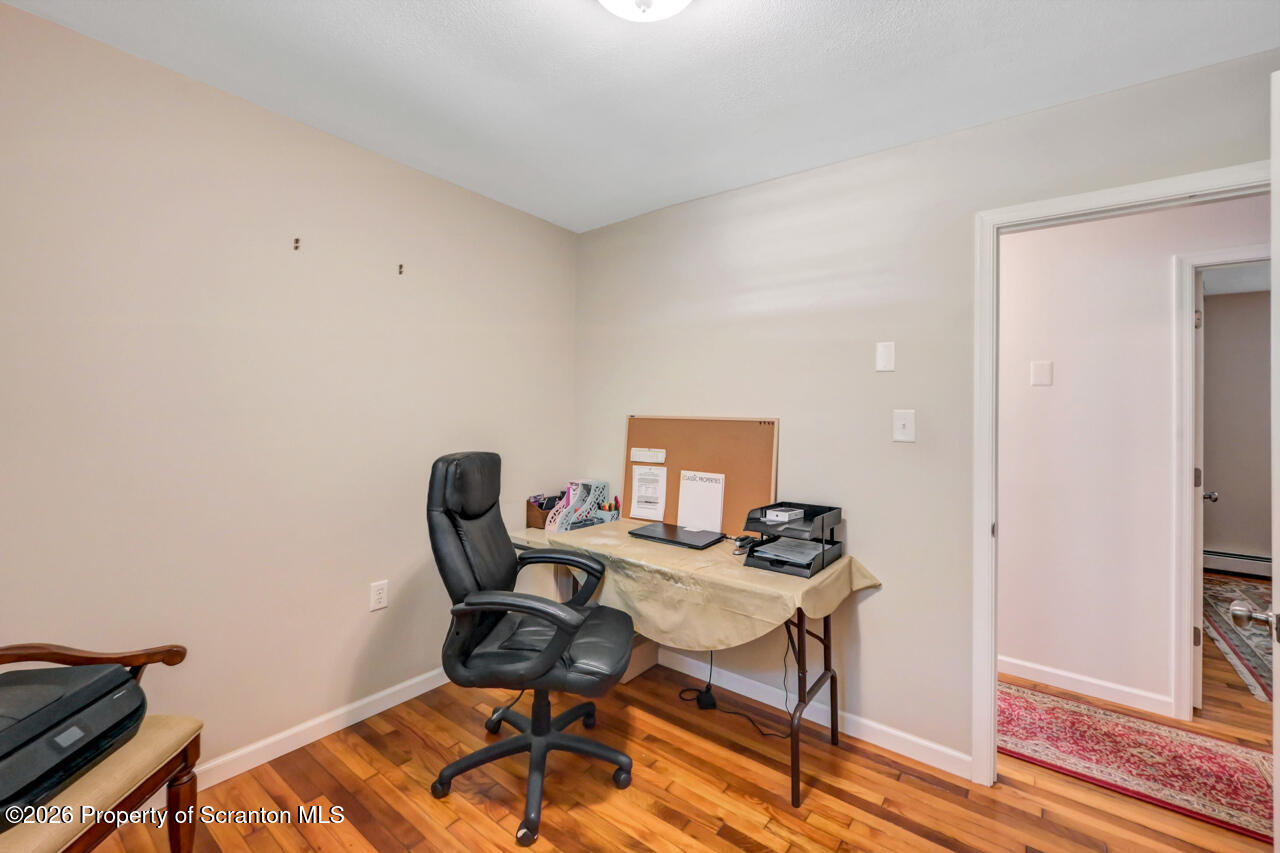 3660 Aberdeen Road Moscow, PA 18444 - Photo 47 of 68 a view of a workspace with furniture and wooden floor