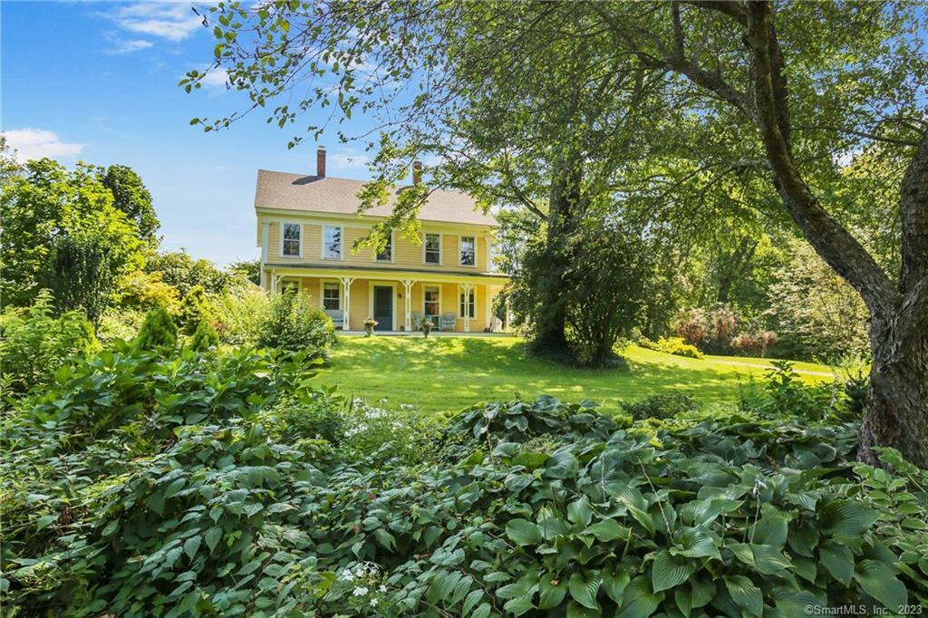 22 Harrisville Road Pomfret, CT 06259 - Photo 1 of 1 a view of a big yard with plants and large trees