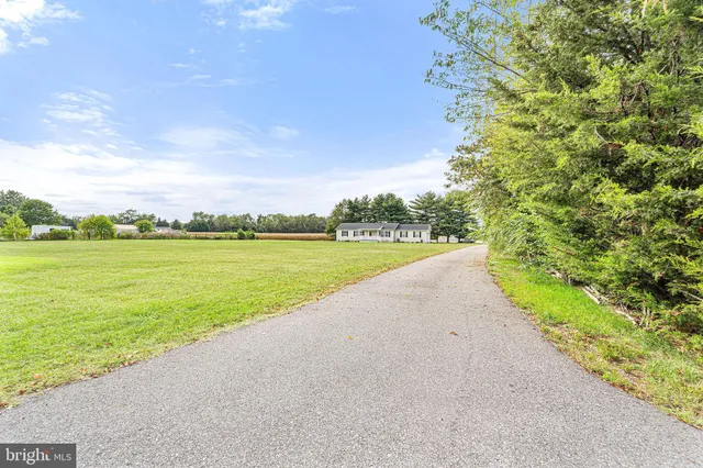 a view of balcony with wooden floor