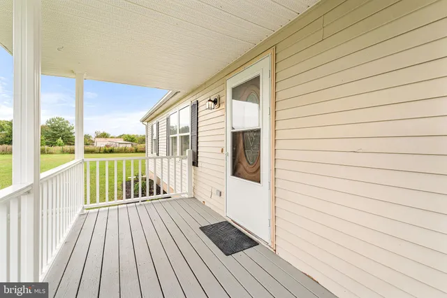 a view of a kitchen cabinets and wooden floor