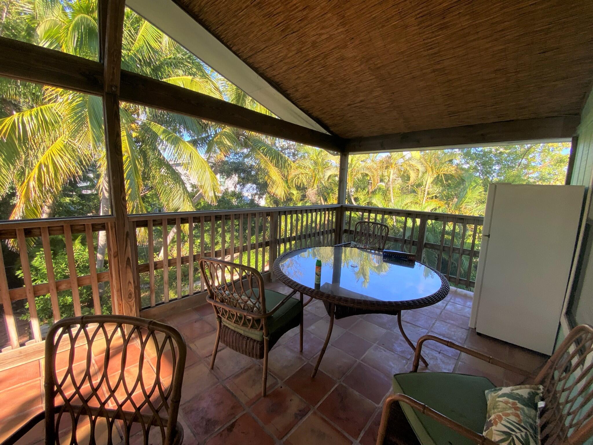 27035 Dolphin Road Summerland Key, FL 33042 - Photo 11 of 15 27035 Dolphin back screened in porch