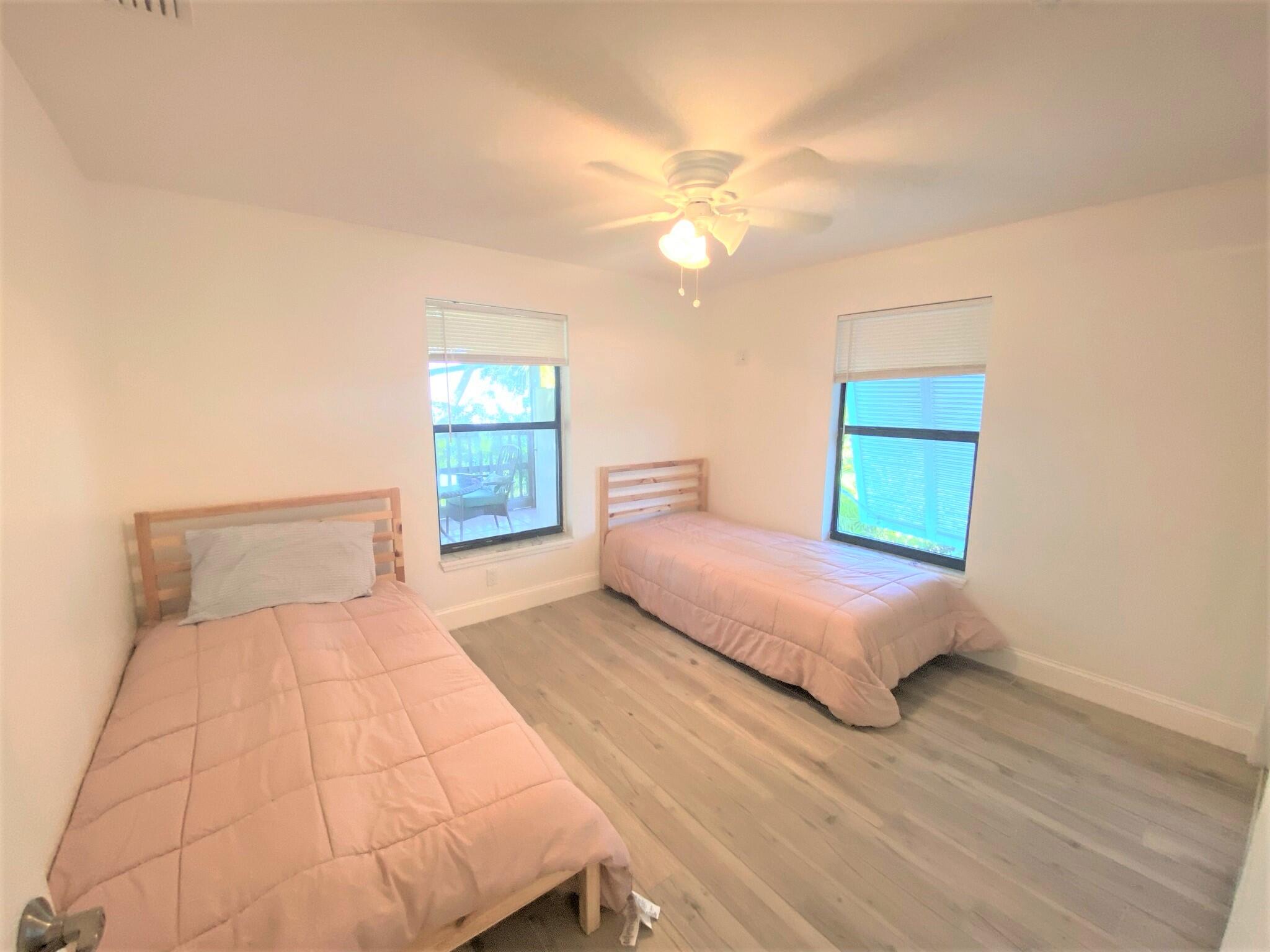 27035 Dolphin Road Summerland Key, FL 33042 - Photo 7 of 15 27035 Dolphin twin bedroom