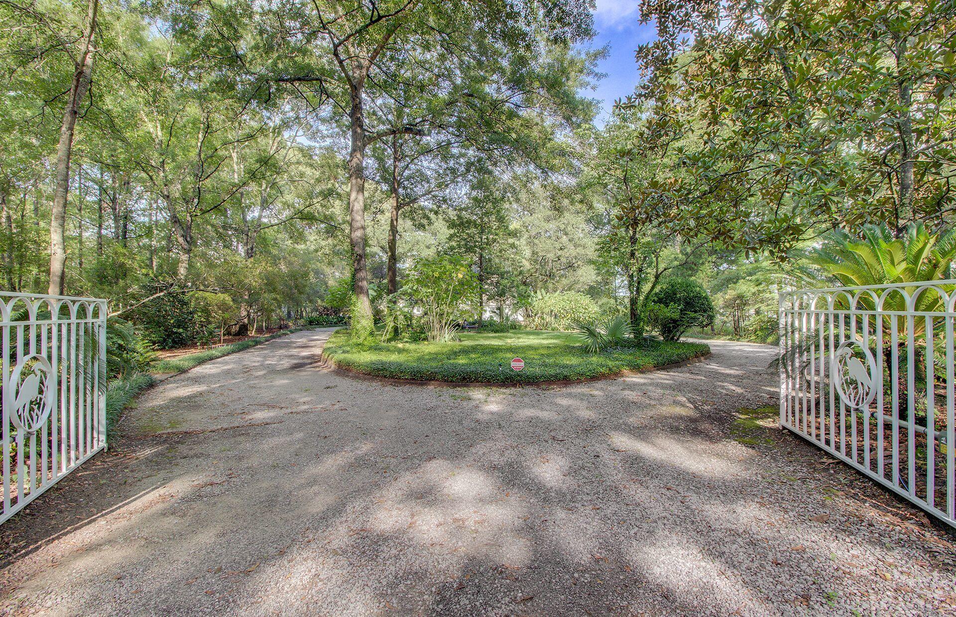 5644 Barbary Coast Road Hollywood, SC 29449 - Photo 12 of 76 Secret gardens and benches throughout