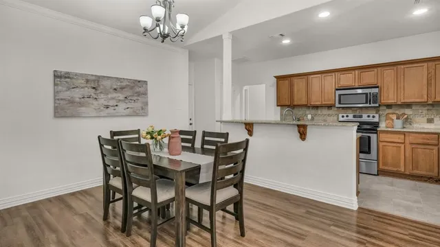a view of kitchen with breakfast area