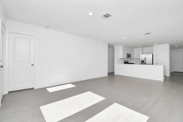 a view of a kitchen with a sink