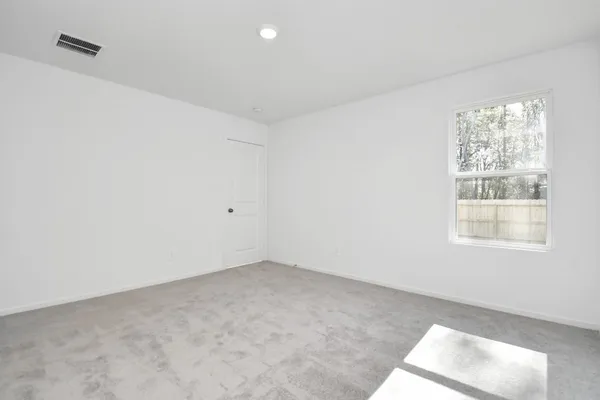 an empty room with a window