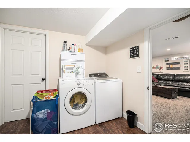 a kitchen with a stove and a refrigerator