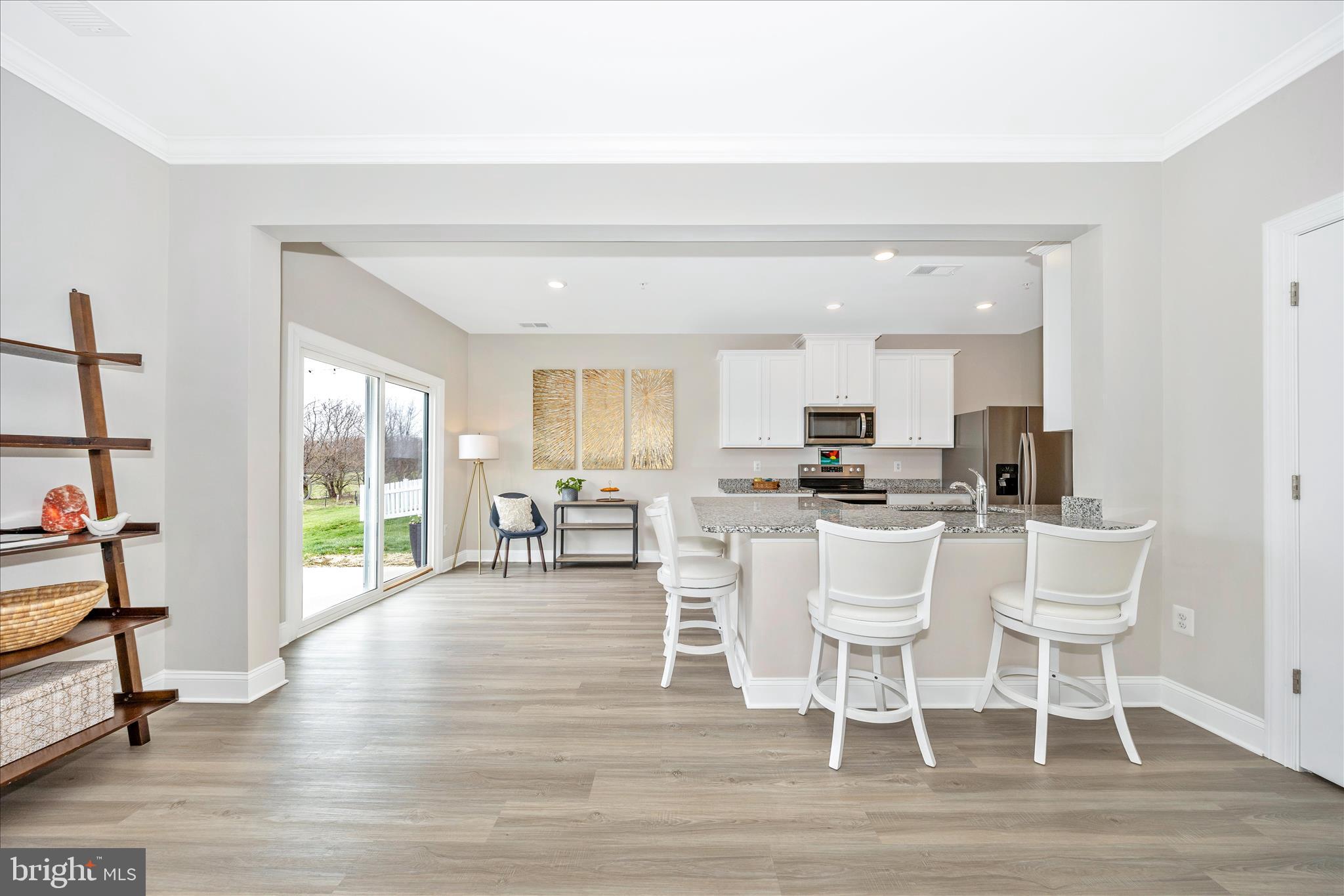 10026 Roulette Drive Hagerstown, MD 21740 - Photo 14 of 73 a view of a dining room with furniture and wooden floor