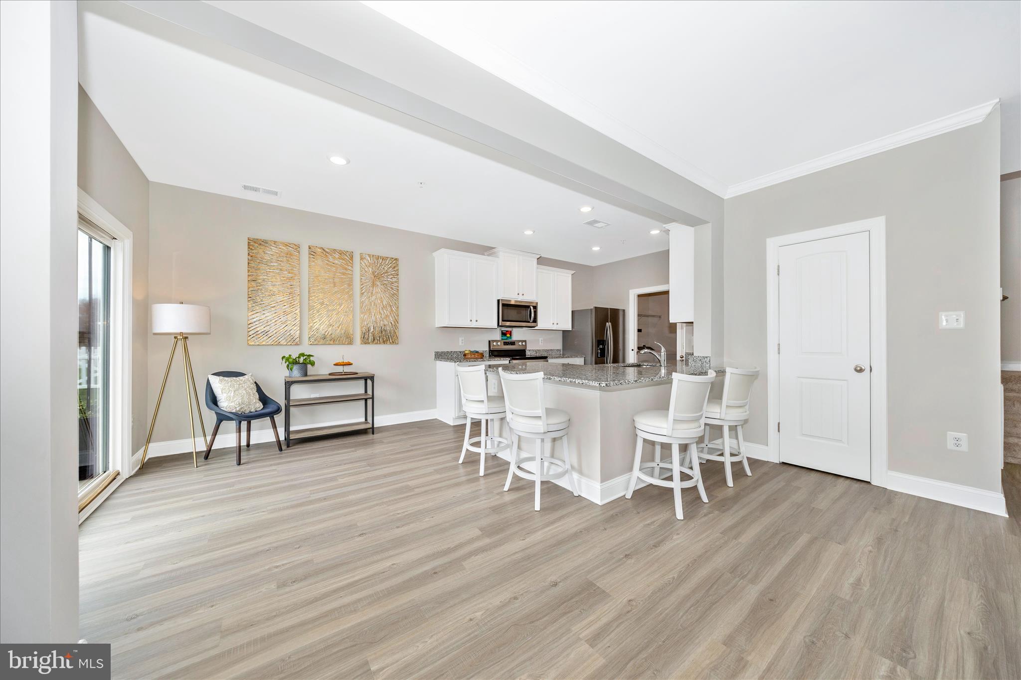 10026 Roulette Drive Hagerstown, MD 21740 - Photo 16 of 73 a dining room with furniture and wooden floor