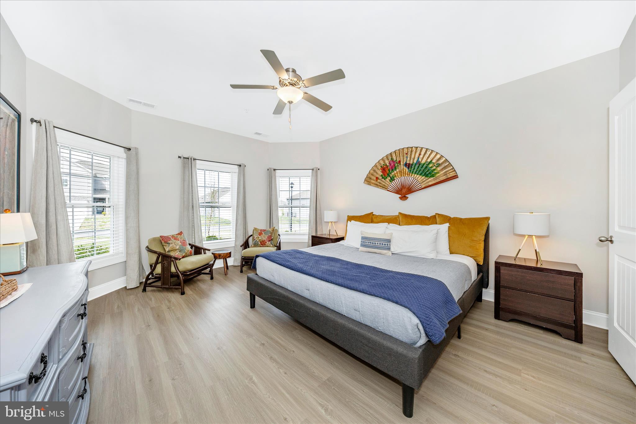10026 Roulette Drive Hagerstown, MD 21740 - Photo 27 of 73 a spacious bedroom with a bed and wooden floor