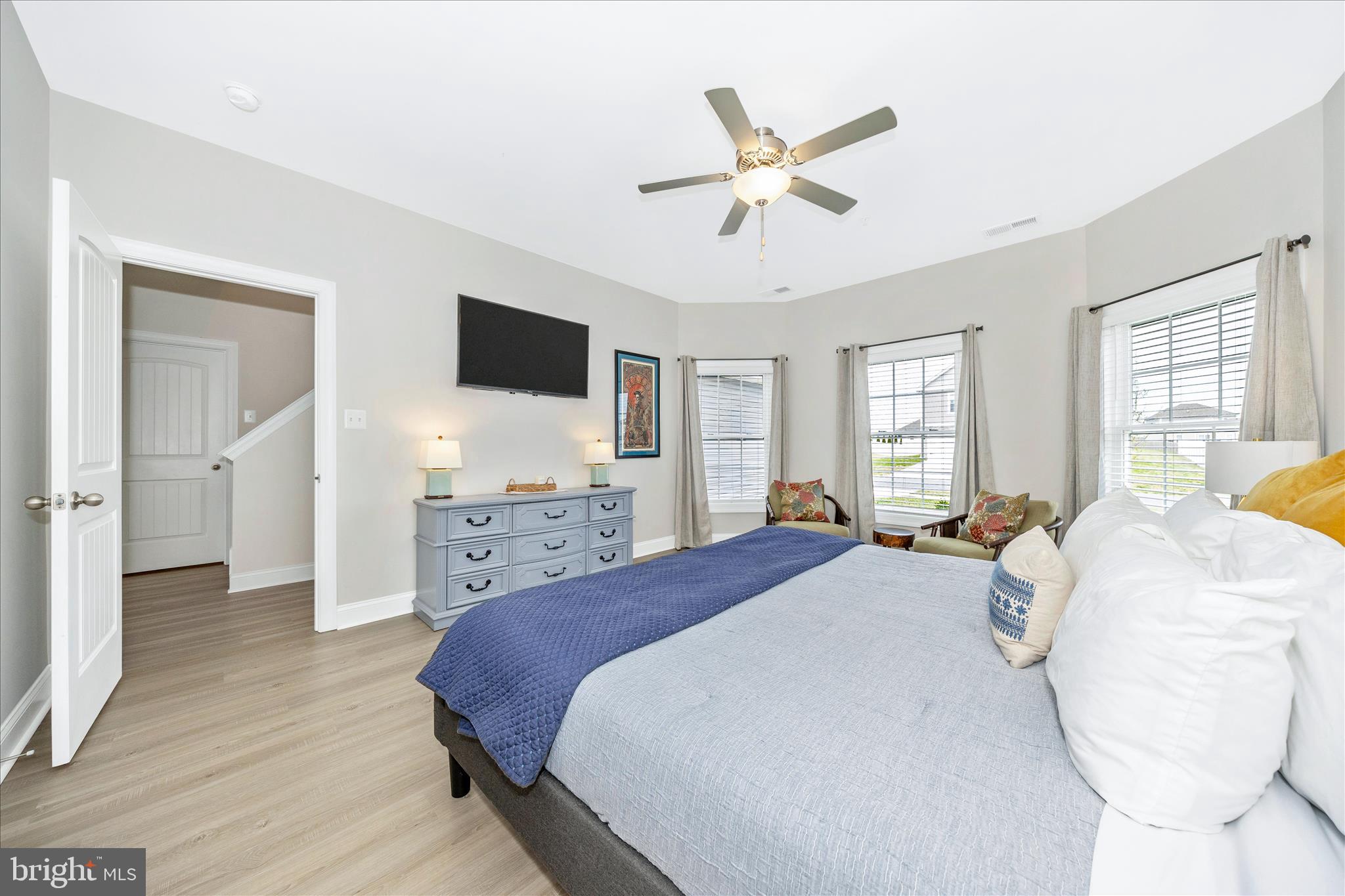 10026 Roulette Drive Hagerstown, MD 21740 - Photo 28 of 73 a spacious bedroom with a bed and a chandelier