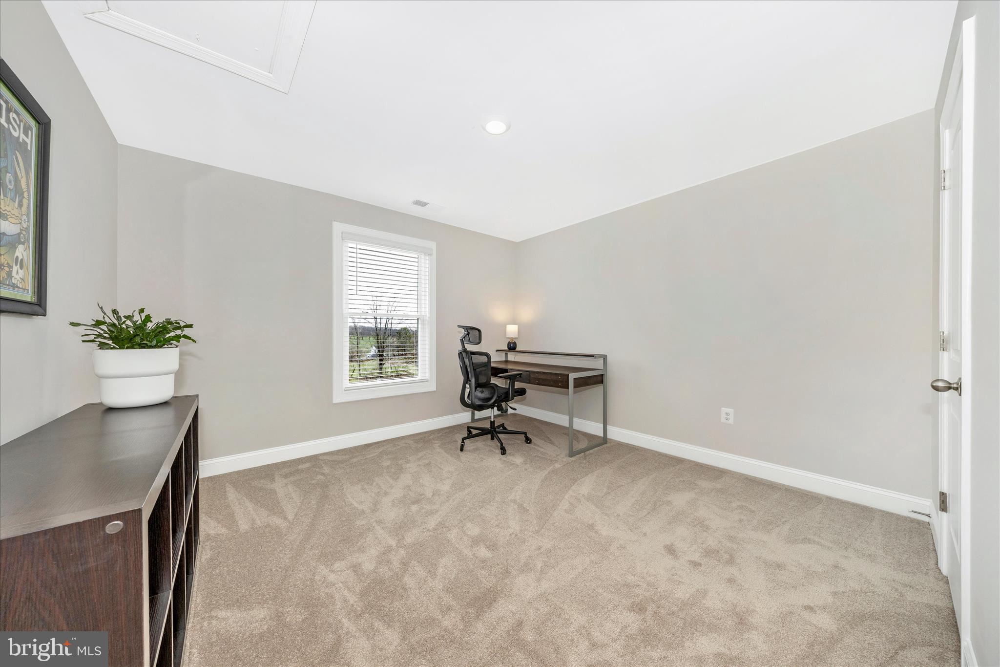 10026 Roulette Drive Hagerstown, MD 21740 - Photo 33 of 73 a living room with furniture and a potted plant