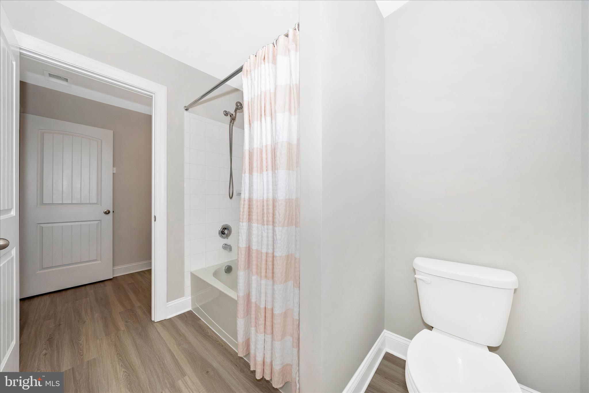 10026 Roulette Drive Hagerstown, MD 21740 - Photo 43 of 73 a bathroom with a toilet and a shower