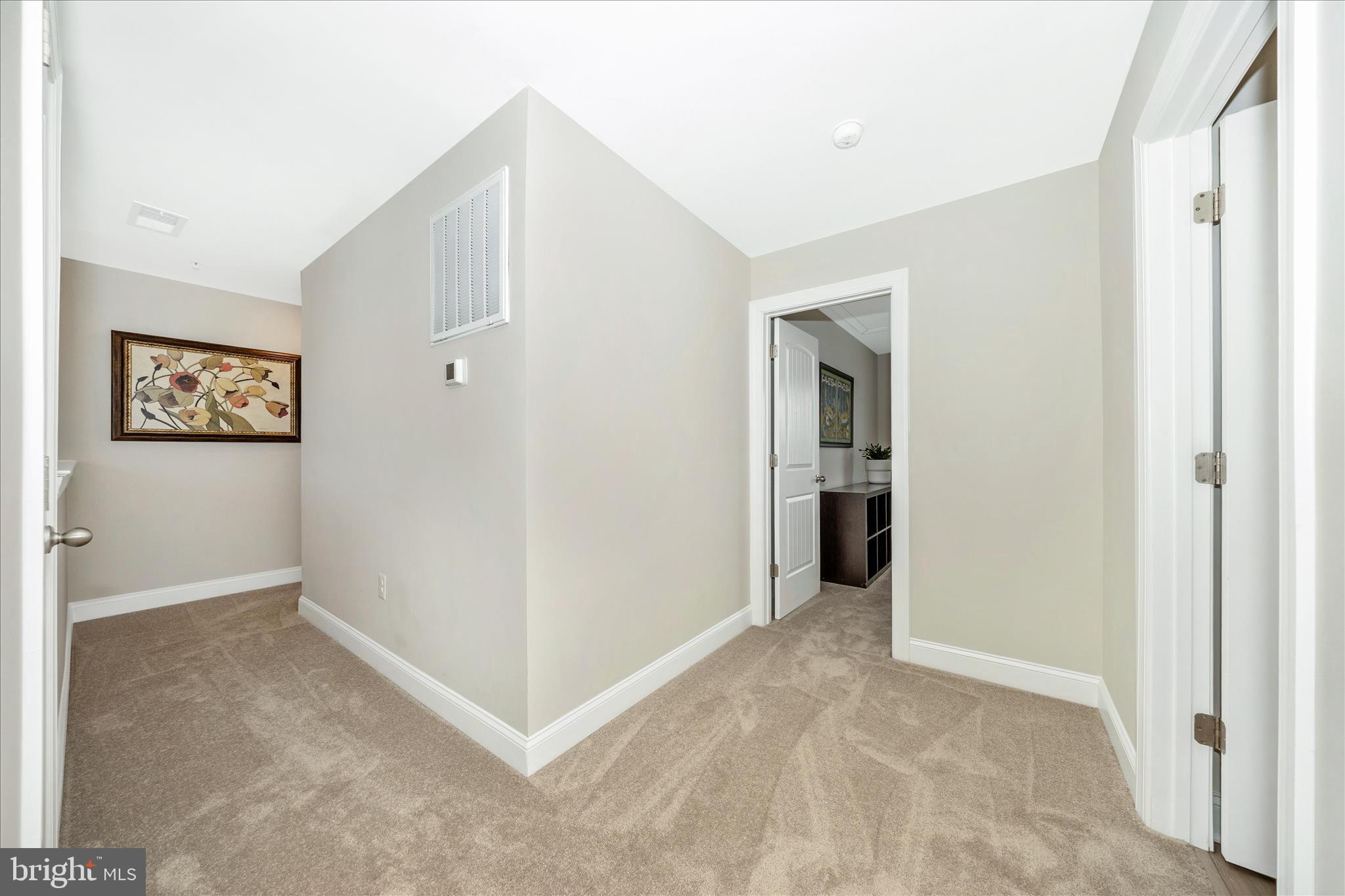 10026 Roulette Drive Hagerstown, MD 21740 - Photo 44 of 73 a view of a hallway with an empty room