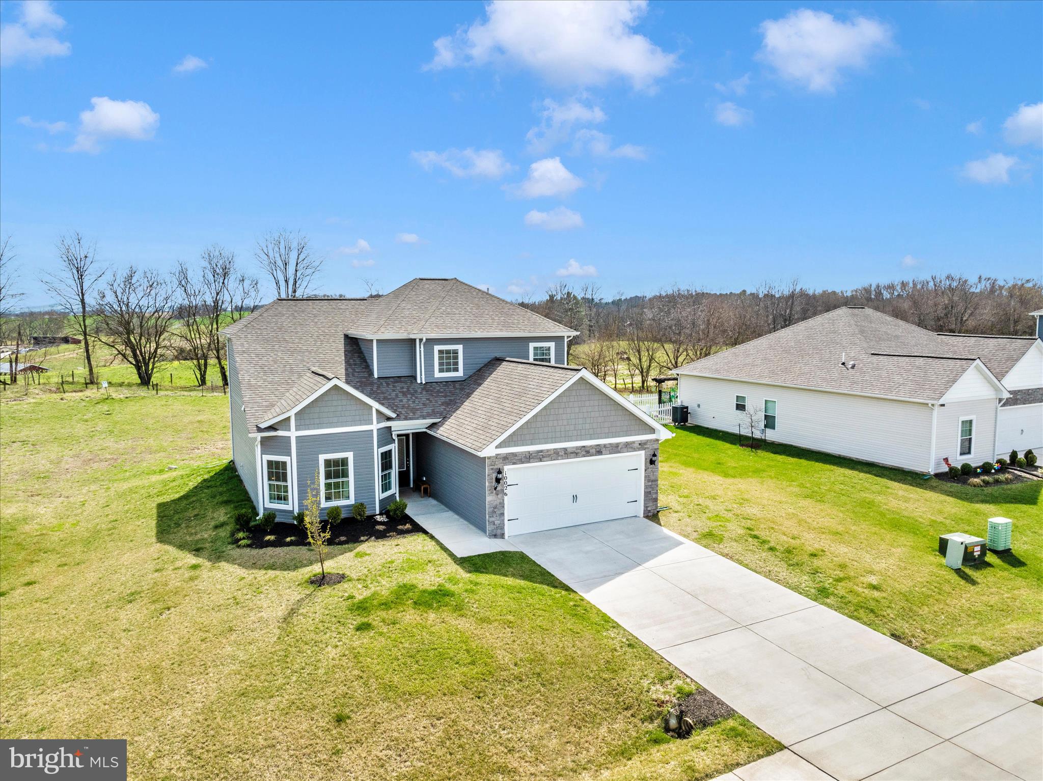 10026 Roulette Drive Hagerstown, MD 21740 - Photo 50 of 73 a front view of a house with a yard
