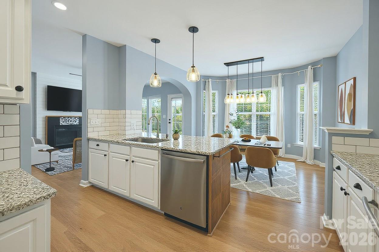 3110 Tanzanite Circle Fort Mill, SC 29708 - Photo 24 of 48 a kitchen with stainless steel appliances granite countertop a sink and a refrigerator