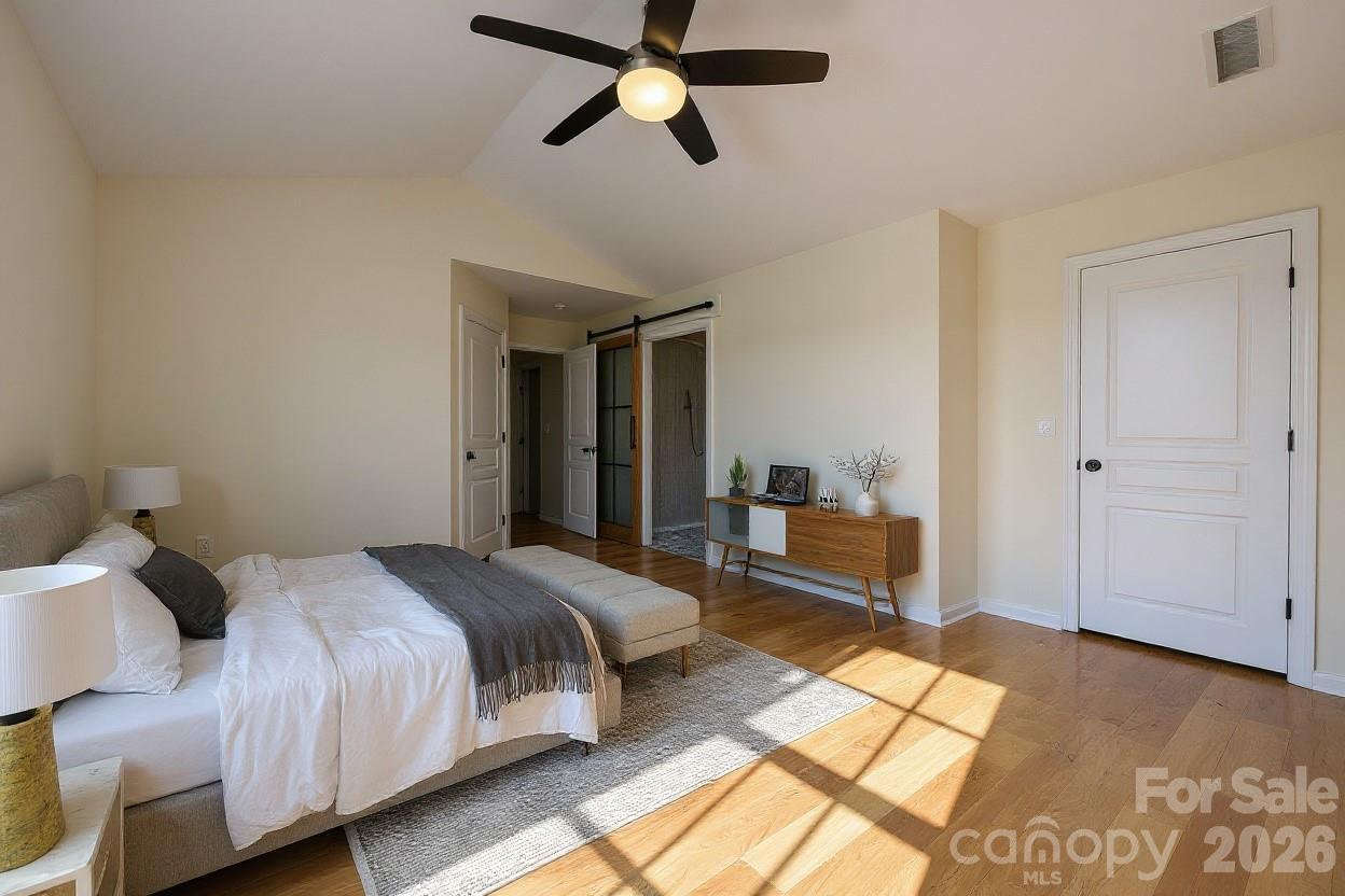 3110 Tanzanite Circle Fort Mill, SC 29708 - Photo 31 of 48 a bedroom with a bed and a couch