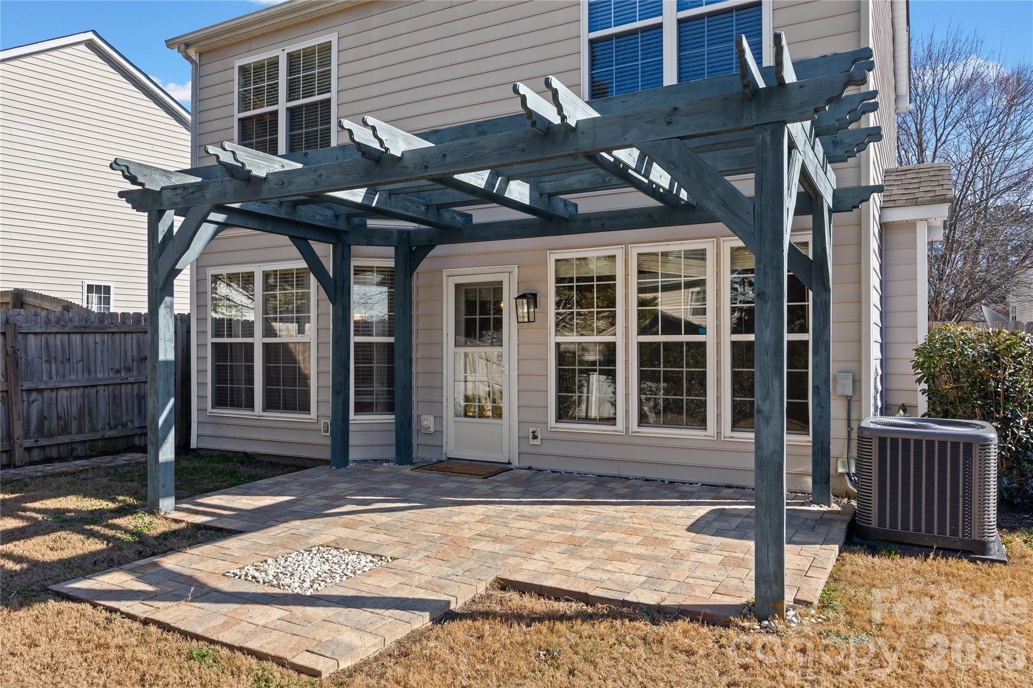 3110 Tanzanite Circle Fort Mill, SC 29708 - Photo 7 of 48 a view of a house with a house and wooden fence