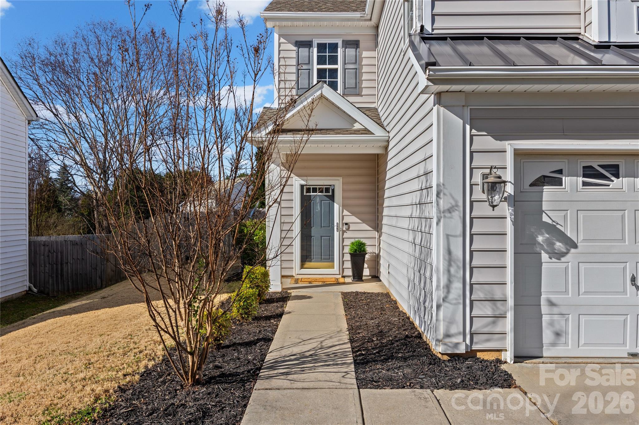 3110 Tanzanite Circle Fort Mill, SC 29708 - Photo 10 of 48 a front view of a house with a yard