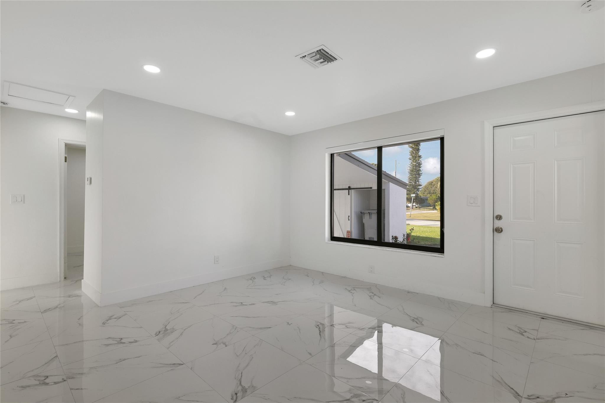 6374 Southwest 2nd Street Margate, FL 33068 - Photo 15 of 28 a view of an empty room with a window