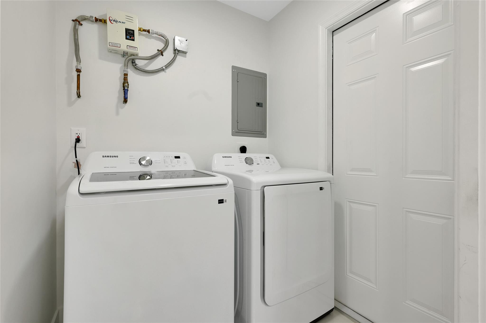 6374 Southwest 2nd Street Margate, FL 33068 - Photo 20 of 28 a utility room with dryer and washer