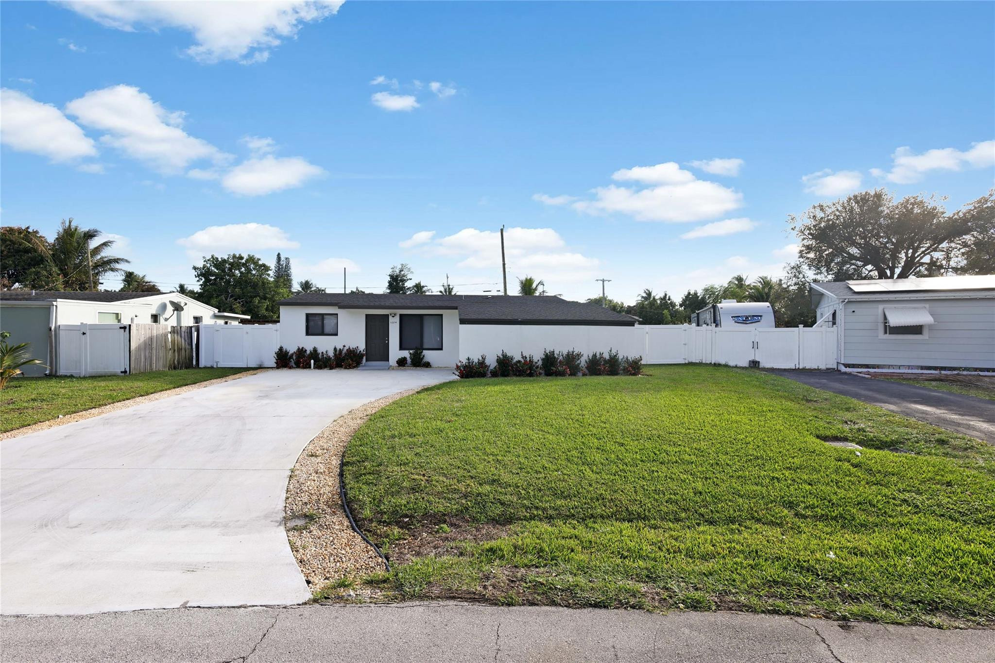6374 Southwest 2nd Street Margate, FL 33068 - Photo 2 of 28 a swimming pool view with a outdoor space