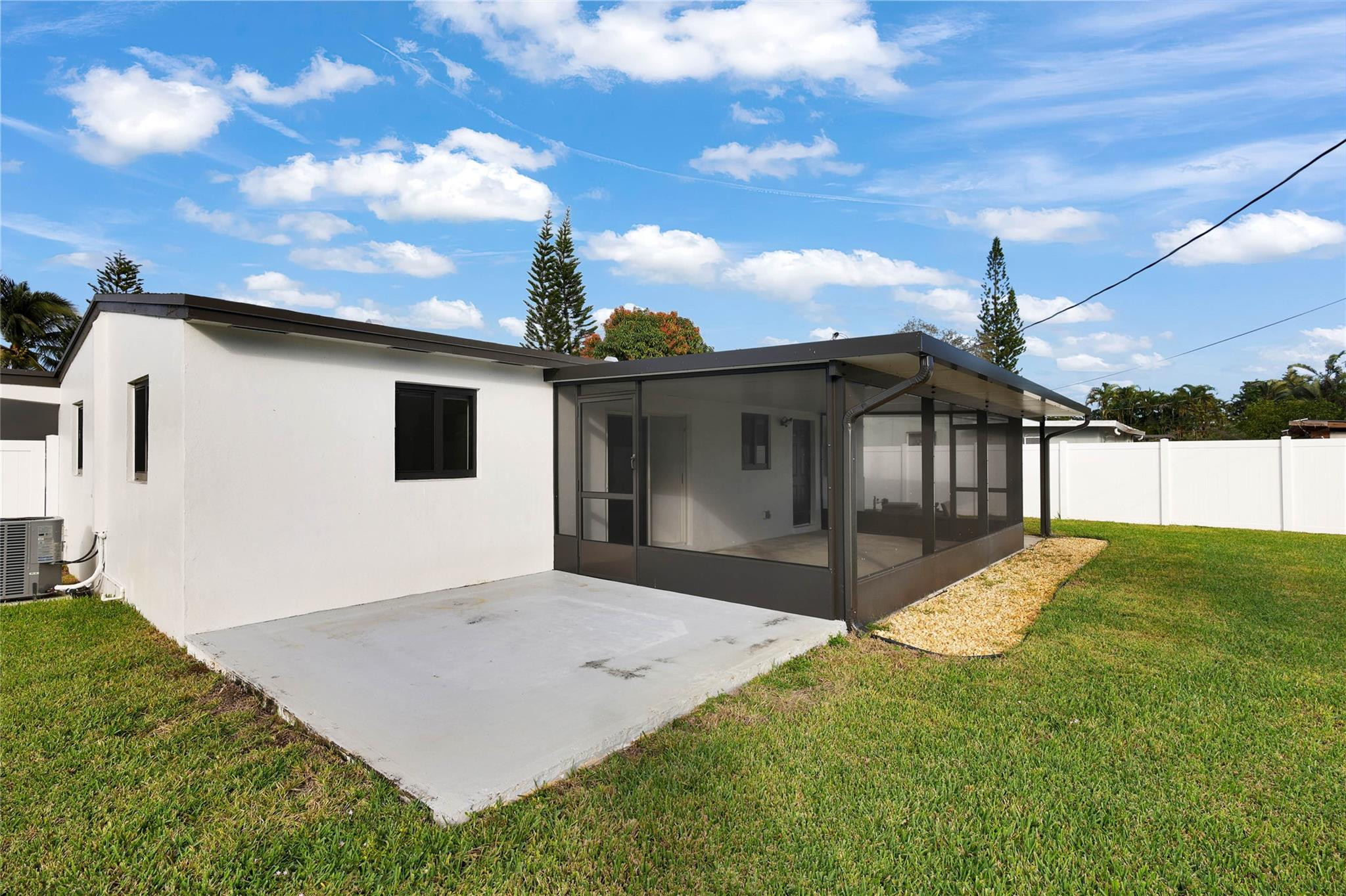 6374 Southwest 2nd Street Margate, FL 33068 - Photo 24 of 28 a front view of a house with a yard