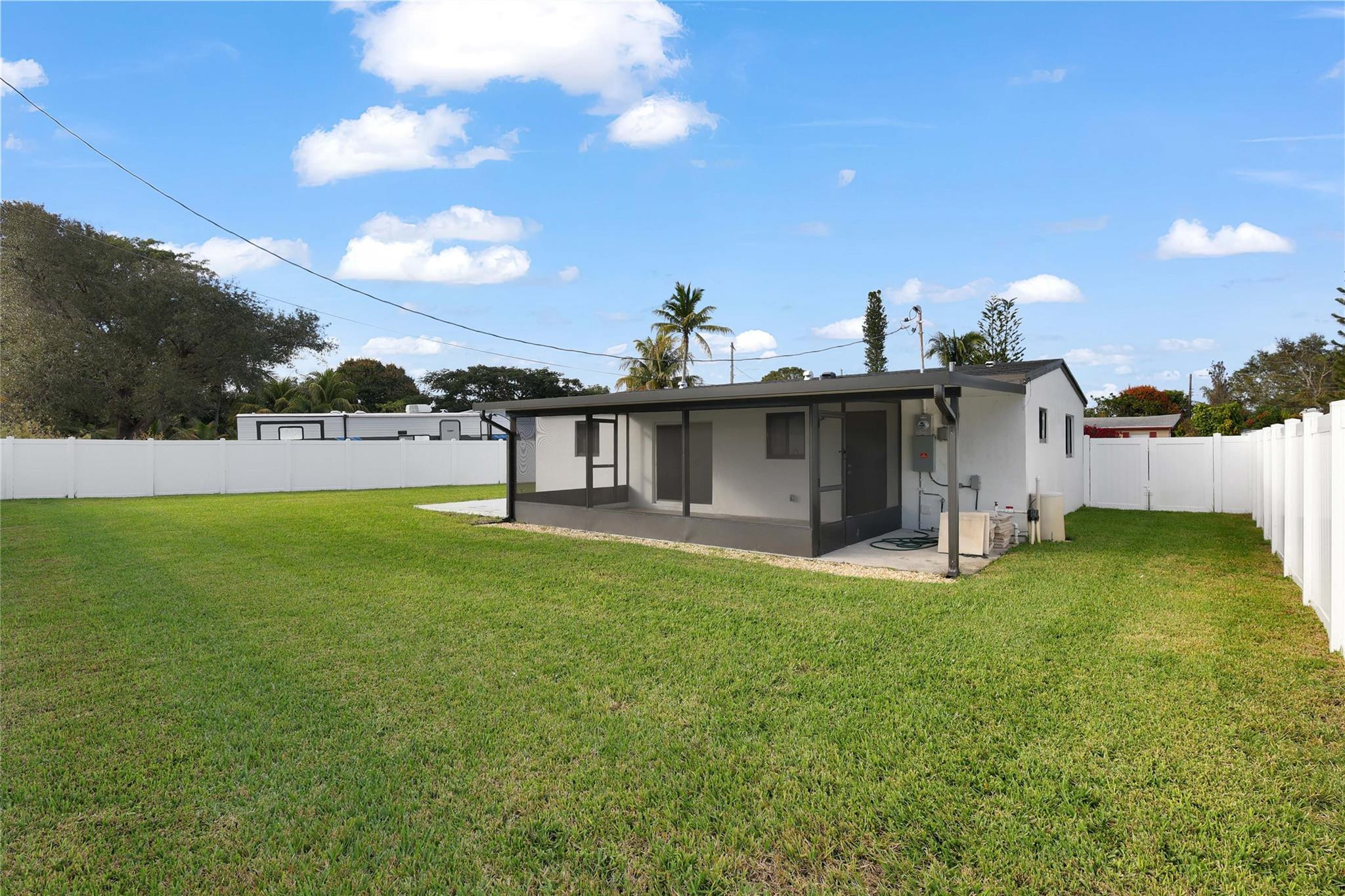 6374 Southwest 2nd Street Margate, FL 33068 - Photo 27 of 28 a view of a house with a yard and sitting area