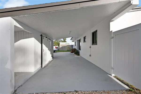 a view of hallway with livingroom