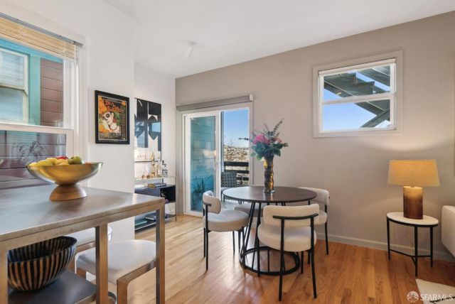 a bathroom with a sink a mirror and a shower