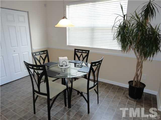 4705 Alenja Lane Raleigh, NC 27616 - Photo 5 of 15 a dining room with furniture and window