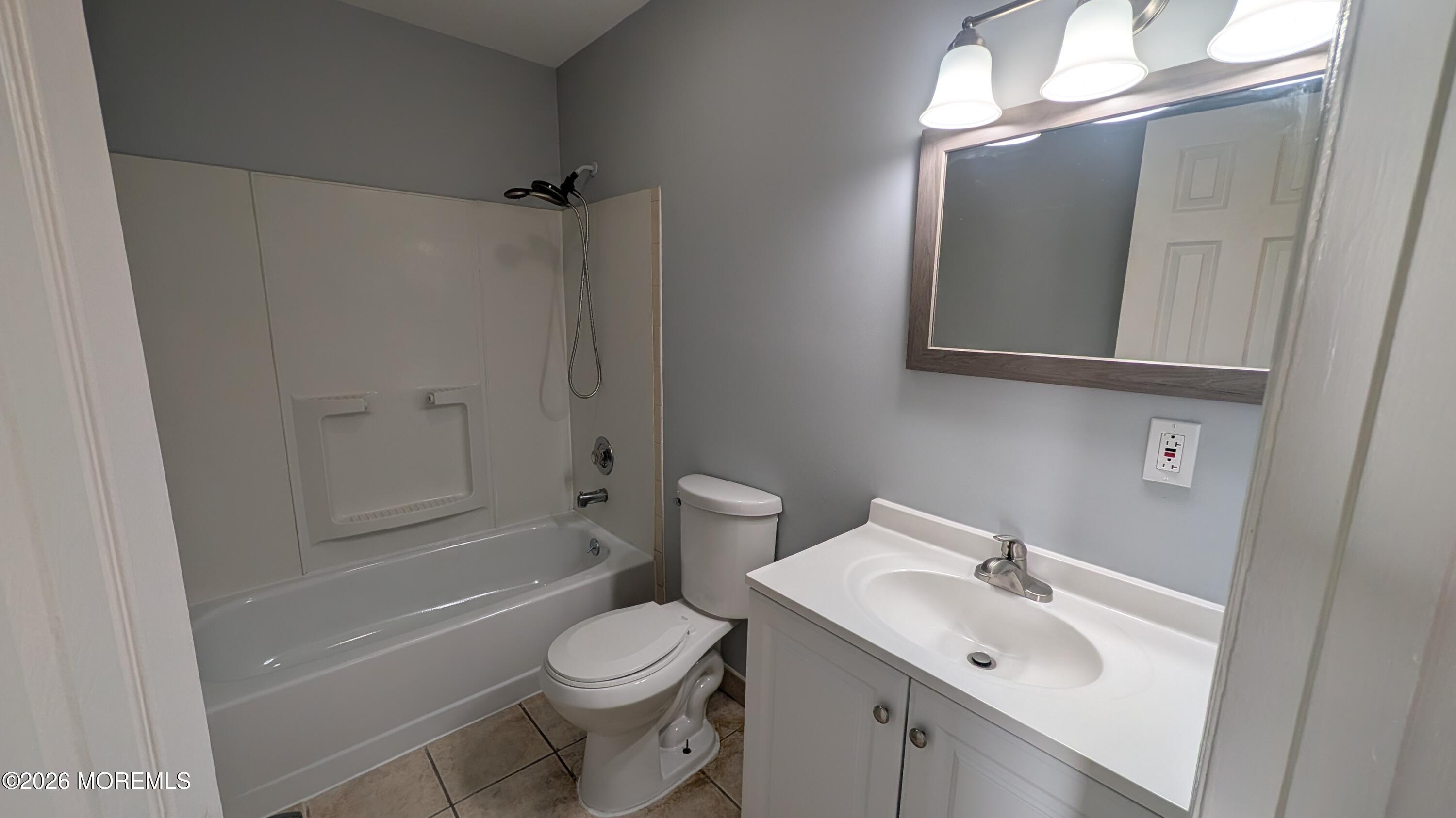 36 Creek Road, Unit 276 Brick, NJ 08724 - Photo 23 of 27 a white toilet sitting next to a bathroom sink