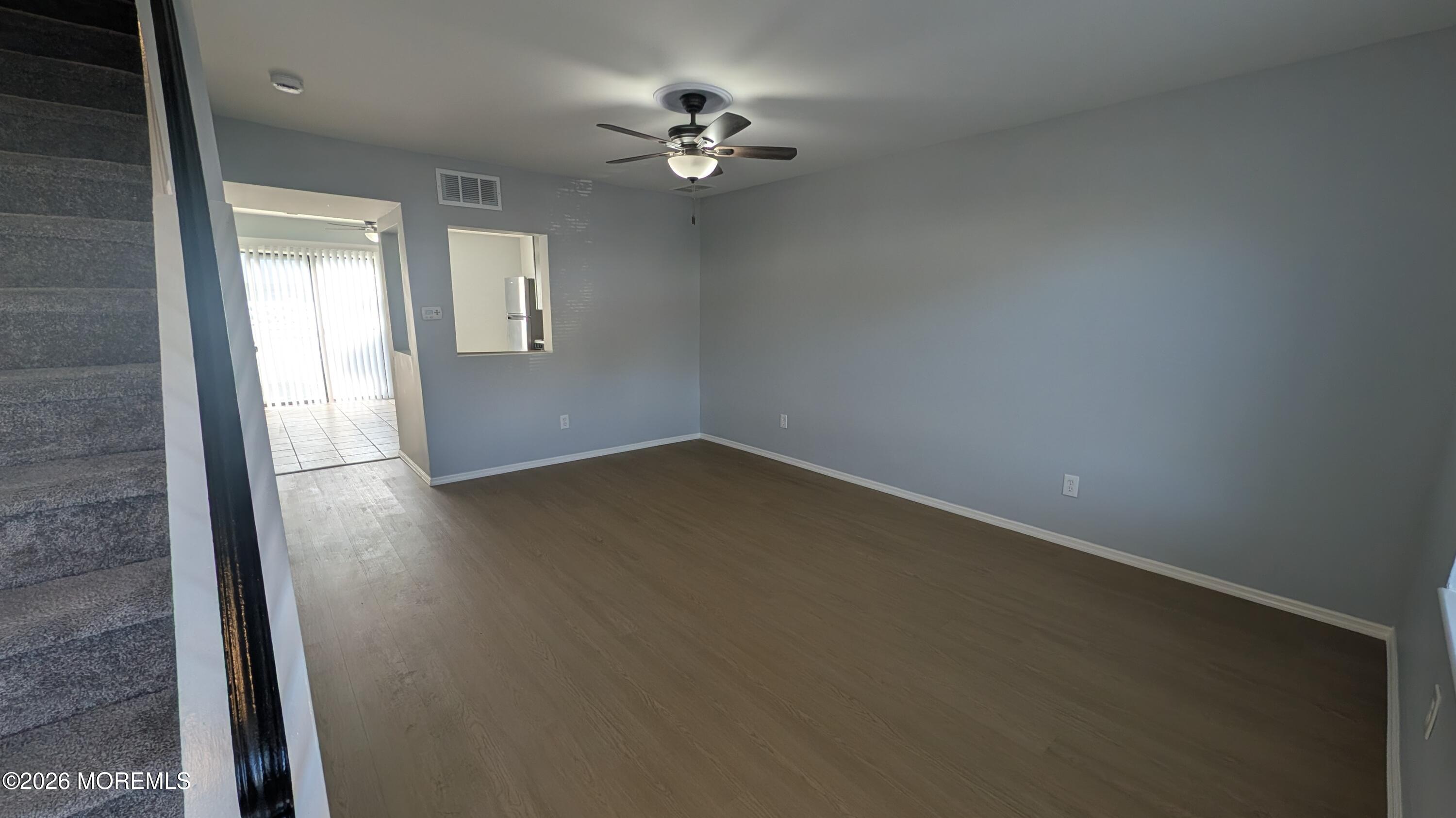 36 Creek Road, Unit 276 Brick, NJ 08724 - Photo 6 of 27 wooden floor in an empty room with a window