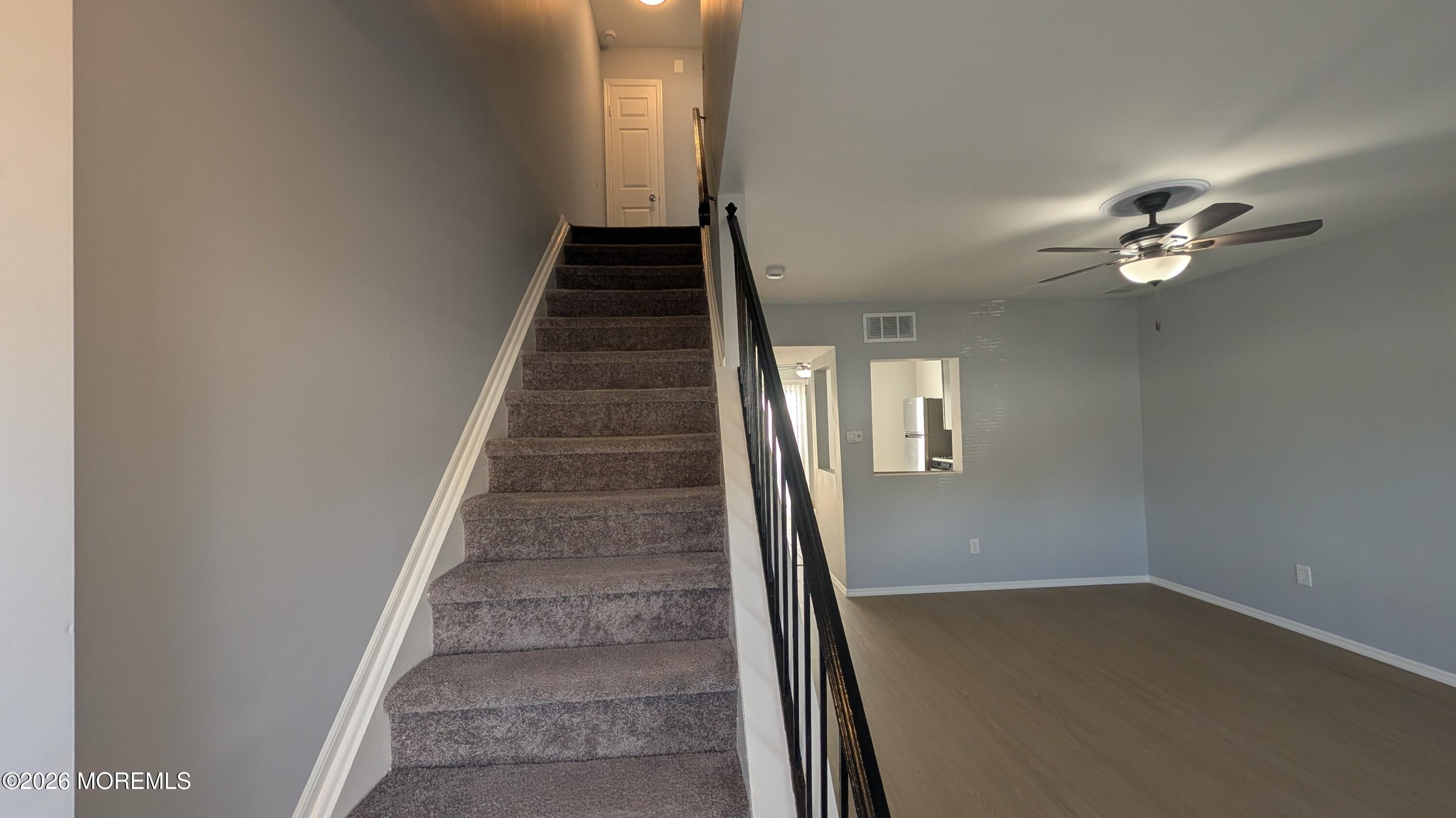 36 Creek Road, Unit 276 Brick, NJ 08724 - Photo 8 of 27 wooden floor with staircase
