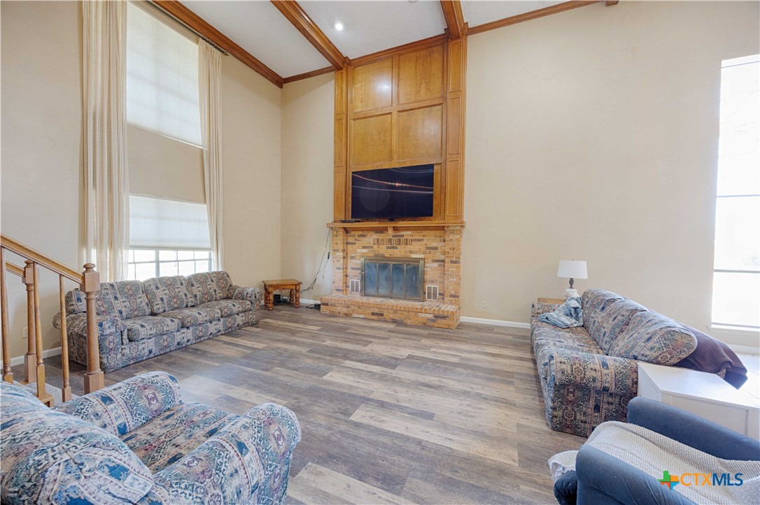 2745 Holub Road Schulenburg, TX 78956 - Photo 12 of 45 a spacious bedroom with a bed and a flat screen tv