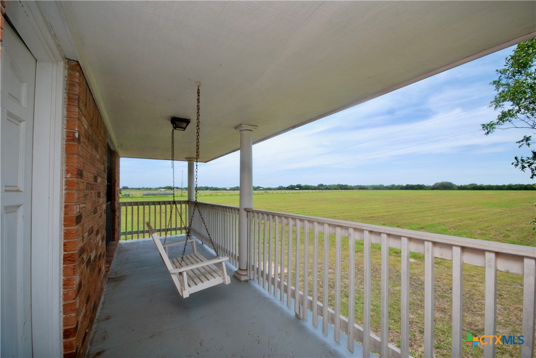 2745 Holub Road Schulenburg, TX 78956 - Photo 32 of 45 a view of a balcony with an ocean view
