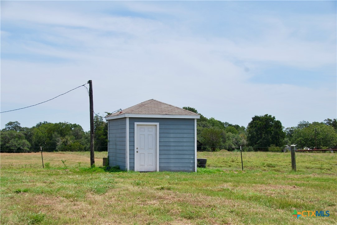 2745 Holub Road Schulenburg, TX 78956 - Photo 34 of 45 a front view of a house with a yard