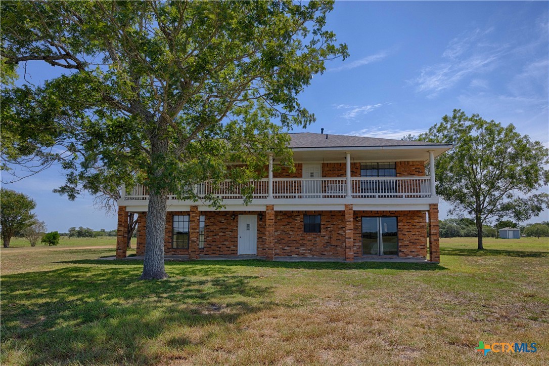 2745 Holub Road Schulenburg, TX 78956 - Photo 6 of 45 a front view of a house with a yard