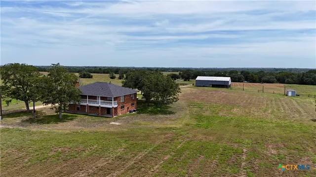 an aerial view of a house with balcony