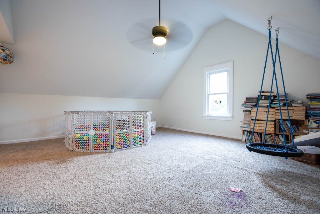 1106 Hillstone Road Cleveland Heights, OH 44121 - Photo 25 of 35 Rec room with ceiling fan, light carpet, and lofted ceiling