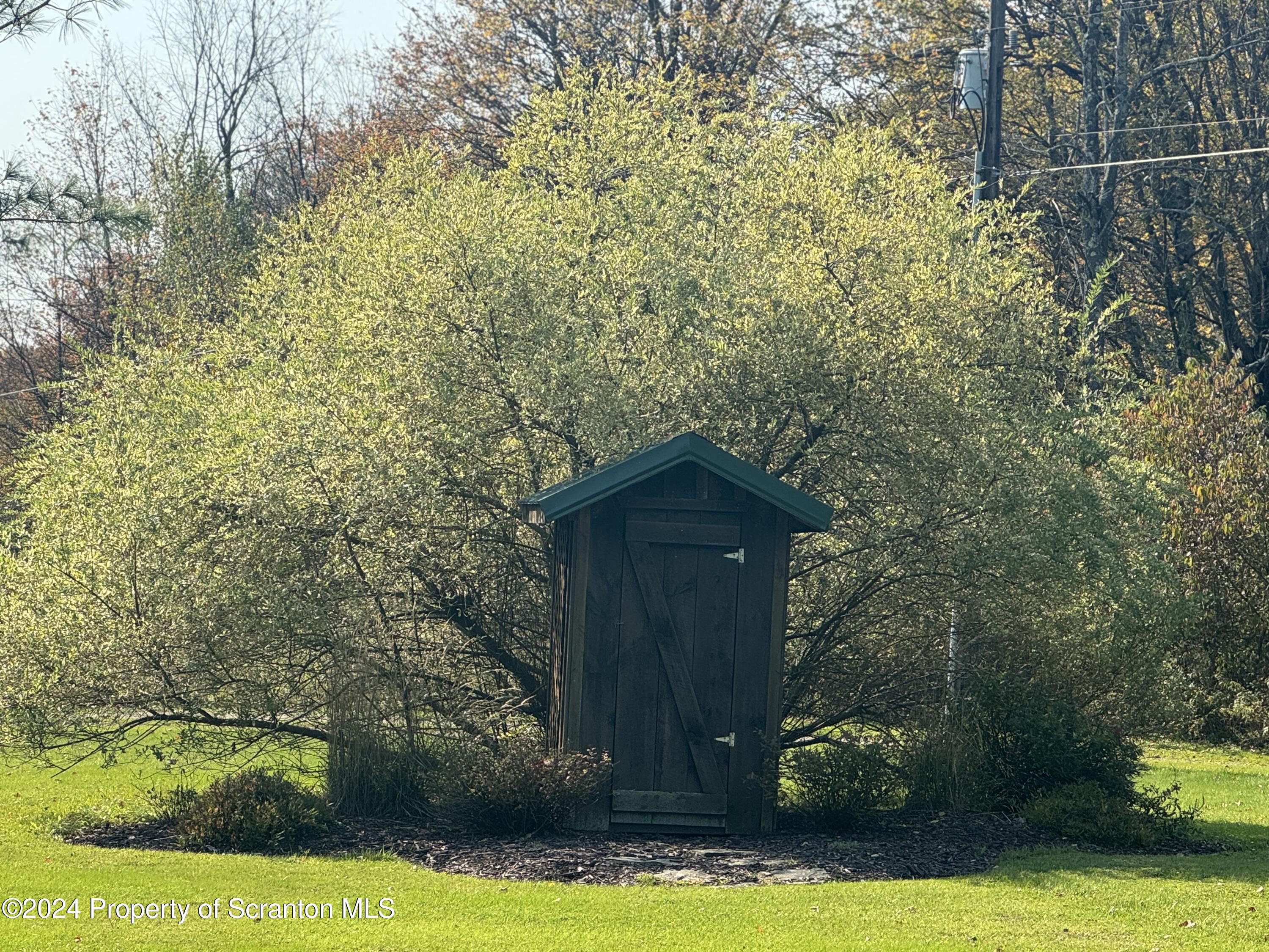 3365 Lake Of Meadows Road Little Meadows, PA 18830 - Photo 36 of 36 Outhouse
