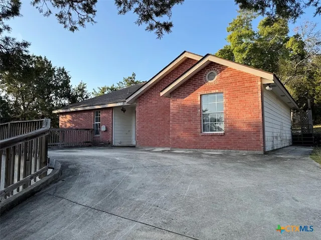 a view of backyard of house