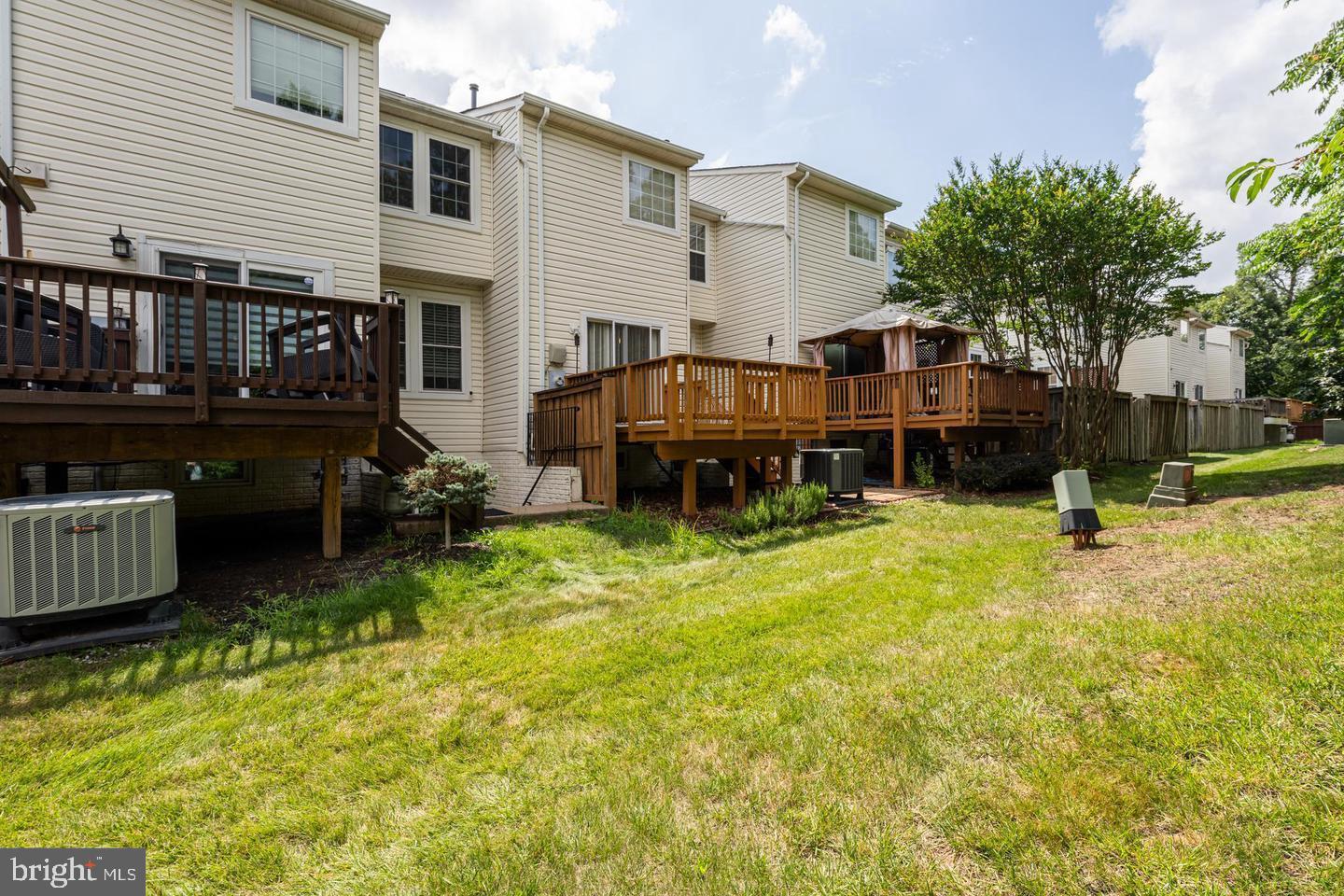 43122 Forest Edge Square Broadlands, VA 20148 - Photo 13 of 24 a view of a house with a yard