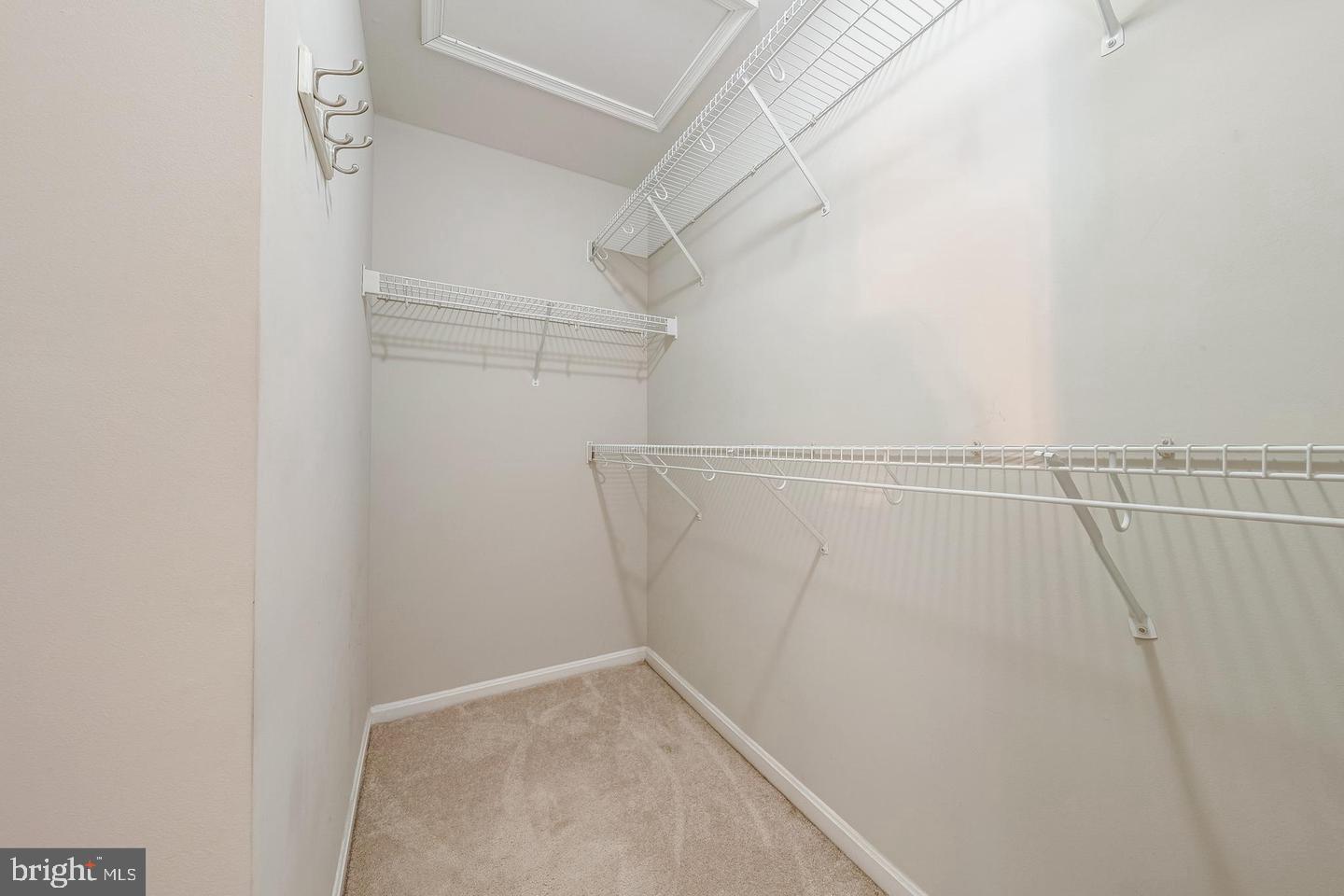 43122 Forest Edge Square Broadlands, VA 20148 - Photo 16 of 24 a view of a room with racks on the wall