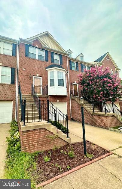 43122 Forest Edge Square Broadlands, VA 20148 - Photo 2 of 24 a front view of a house