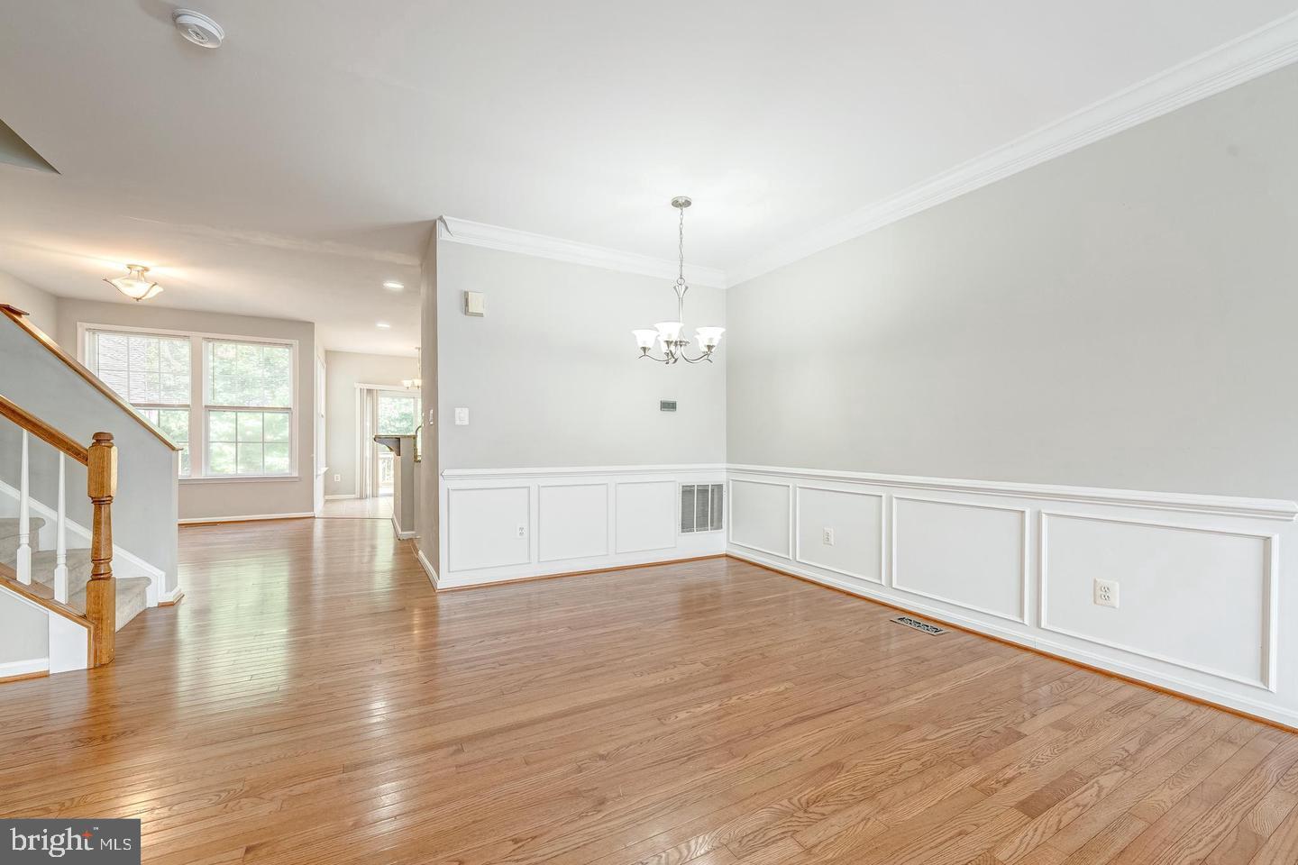 43122 Forest Edge Square Broadlands, VA 20148 - Photo 8 of 24 a view of an empty room with wooden floor