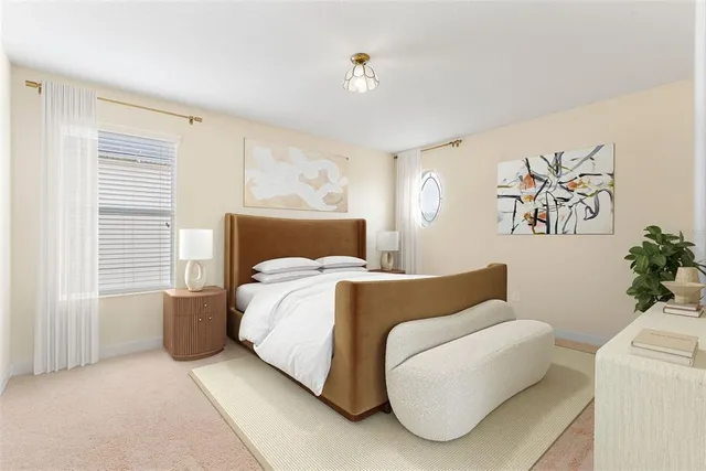 a bedroom with a bed and a couch